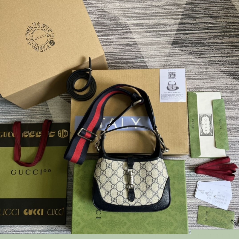 G*u*i top handle bags